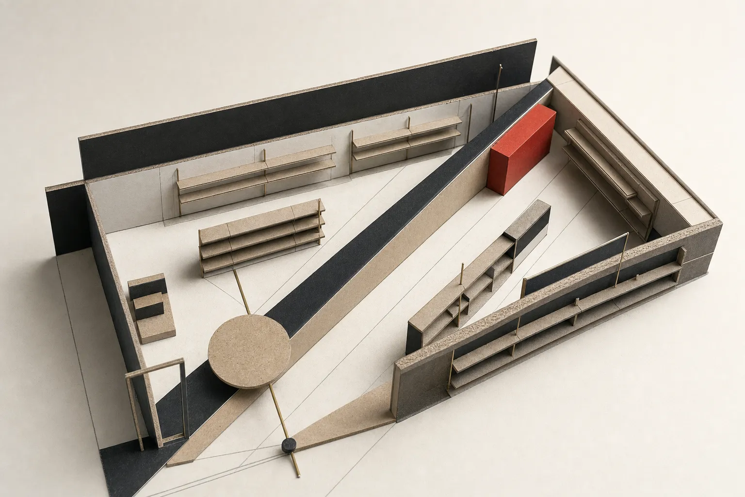 A constructivist physical study model of a retail floor plan with geometric shelf modules, aisles, and spatial grid markers.